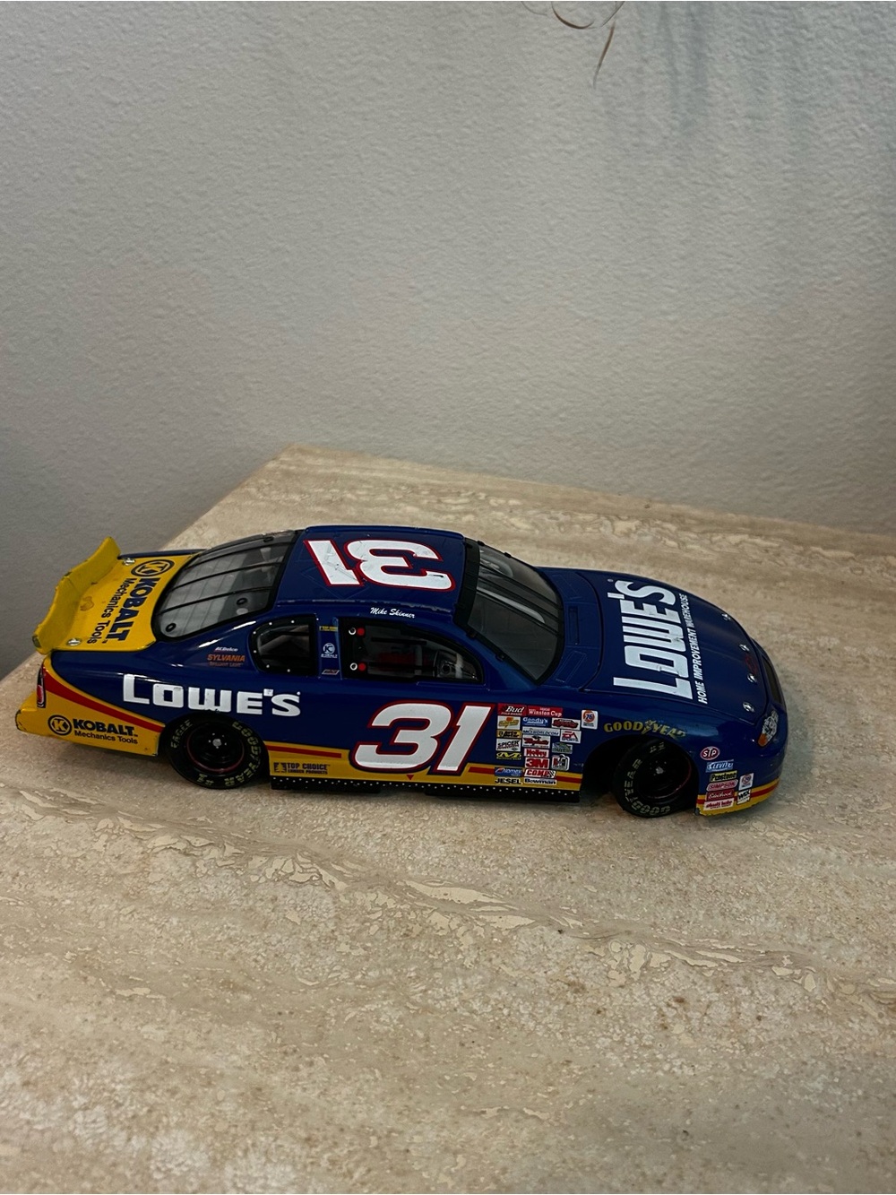 #31 Blue and Yellow Die-Cast Race Car Toy Lowe’s
